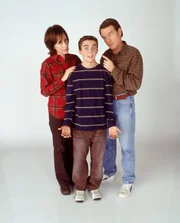 L-R: Lois (Jane Kaczmarek), Malcolm (Frankie Muniz), Hal (Bryan Cranston)