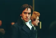L-R: Mr. Darcy (Matthew MacFadyen), Mr. Collins (Tom Hollander)