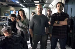 In the middle, on the left: Jonas Taylor (Jason Statham)