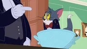 Tom (r.)