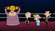 Mrs. Wicket hält stolz den Siegergürtel in die Luft. Mrs. Wicket hält stolz den Siegergürtel in die Luft.