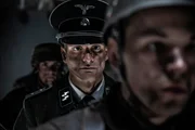 REENACTMENT- Obersturmbannf&uuml;hrer Werner Knab wartet auf die Landung seines deutschen Segelflugzeugs in Vassieux-en-Vercors. Gespielt von: Alessandro Pekin (Holdout II Productions Inc./Liam Herring)
