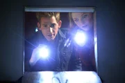 "Exile" -- Greg Sanders (Eric Szmanda, left) and Morgan Brody (Elisabeth Harnois) smile in delight as they focus on what could be valuable evidence, on CSI: CRIME SCENE INVESTIGATION. "Exile" -- Greg Sanders (Eric Szmanda, left) and Morgan Brody (Elisabeth Harnois) smile in delight as they focus on what could be valuable evidence, on CSI: CRIME SCENE INVESTIGATION.