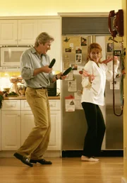 John Clark (Richard Gere, l.); Beverly Clark (Susan Sarandon, r.)
