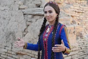 Turkmenische Musliminnen tragen selbstbewusst die Landestracht, aber keinen Gesichtsschleier.