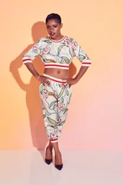 Tamia 'Coop' Cooper (Bre-Z).