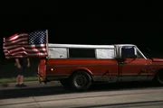 Farmtruck proudly waving Old Glory.