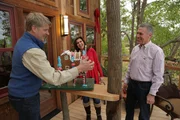 Pete talking to the homeowners in their newly finished treehouse.