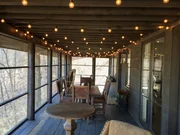 The porch interior where the bridge to the treehouse will start.