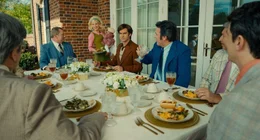 Jessica Chastain (Tammy Faye Bakker), Andrew Garfield (Jim Bakker).