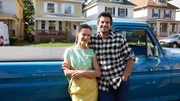 Ethan and Elizabeth Finkelstein with their truck, Old Blue, outside the Troy house after the renovation, as seen on Who's Afraid of a Cheap Old House?, Season 1.