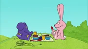 Hase und Elefant machen ein Picknick.