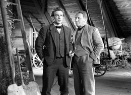 Der Knecht Uli (Hannes Schmidhauser) und sein MeisterJohannes Bodenbauer (Heinrich Gretler)