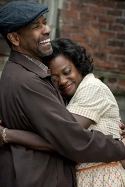Denzel Washington plays Troy Maxson and Viola Davis plays Rose Maxson in Fences from Paramount Pictures. Directed by Denzel Washington from a screenplay by August Wilson.