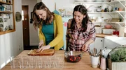 Host Molly Yeh, with her guest Anna Sather, assembling her Mini Rose Water Trifles with Cardamom Cream, as seen on Girl Meets Farm, Season 3.