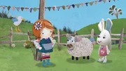 Lily findet, dass Flöckchens Schaf mit den Blümchen sehr hübsch ausschaut. Lily findet, dass Flöckchens Schaf mit den Blümchen sehr hübsch ausschaut.