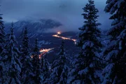 Snow filled mountain, trees, and highway from lookout point. Snow filled mountain, trees, and highway from lookout point.