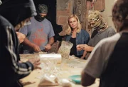 Mariana van Zeller observes as group packages cocaine. (Credit: National Geographic)