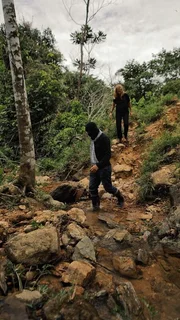 Mariana van Zeller (R) follows Sonia's gunman as she investigates the world of cocaine trafficking. (Credit: National Geographic)