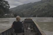 Mariana van Zeller traveling by boat while investigating the world of cocaine trafficking. (Credit: National Geographic)