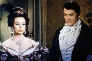 Ir&egrave;ne (Dany Robin) diskutiert mit ihrem Liebhaber Graf Rodolphe de Sambreuil (Jean Marais) &uuml;ber dessen Prinzipien.