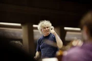 Sir Simon Rattle.
