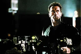 U.S. Marshal John "The Eraser" Kruger (Arnold Schwarzenegger)