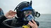 Chris McCully fastening dive mask Chris McCully fastening dive mask