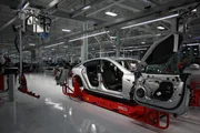 Fremont, CA, USA - Tesla model S being assembled in factory. Fremont, CA, USA - Tesla model S being assembled in factory.
