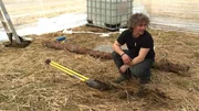 Matt Brown about to prep the soil in the greenhouse.