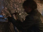 Matt Brown hammering inside his home.