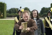 Der arme Bauer bringt dem K&ouml;nig den M&ouml;rser.