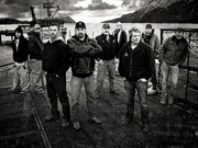 Key art for Season 7. From left to right: Jake Harris, Josh Harris, Captain Andy Hillstrand, Captain Johnathan Hillstrand, Captain Keith Colburn, Captain Bill Wichrowski, Captain Sig Hansen, Jake Anderson, Edgar Hansen.
