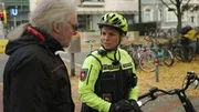 Police Officer Judith talks to a man
