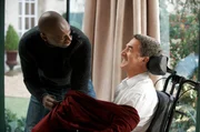Omar Sy (Driss), Francois Cluzet (Philippe).