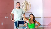 Luke Shantz and Stephanie Sitt portrait with the lamp of the Honeymoon Suite&rsquo;s kitchen at their renovated hotel in Jaco, Costa Rica, as seen on Betting on Paradise, Season 1.