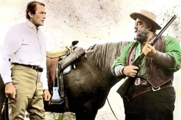 Zwischen Pats Vater und dem alten Rufus Hannassey (Burl Ives, re.) besteht seit Langem eine erbitterte Feindschaft. James McKay (Gregory Peck, li.) versucht zwischen den feindlichen Parteien Frieden zu stiften.