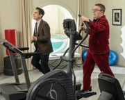 L-R: Phil Dunphy (Ty Burrell), Pepper Saltzman (Nathan Lane)