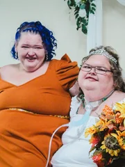 L-R: Amy and Tammy at Tammy's wedding. L-R: Amy and Tammy at Tammy's wedding.