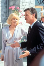 Irene Stanton (Sally Kellerman, l.); Robert Stanton (Ben Masters, r.)