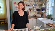 Candid shot of Molly Yeh making her Hazelnut Gelt Cookies.