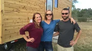 Joe and Kristen are outdoor enthusiasts who are hoping their agent Brandy (left) will find them a tiny home near Fraser, CO that will have magnificent views, a full kitchen and a fireplace, as seen on Tiny House Hunters.