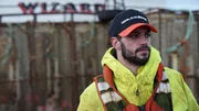 Deckhand Tyler Gateman watches the Wizard greenhorns bait a crab pot.