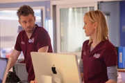 l-r: Dr. Mitch Ripley (Luke Mitchell), Dr. Hannah Asher (Jessy Schram)