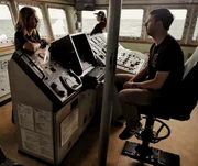 Mariana van Zeller (L) speaking with Peter on board the Sea Shepherd.