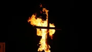A burning cross.