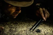 Coyote uses tongs to handle a funnel web spider. Coyote uses tongs to handle a funnel web spider.