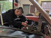 Car mechanic fixing a car
