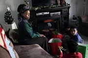 Recreation of Carolyn with children at Christmas