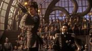 Munitia (Musetta Vander) und Dr. Loveless (Kenneth Branagh)